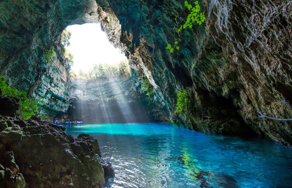 the cave lake melissani with the sunlight reflecting to the turquoise waters