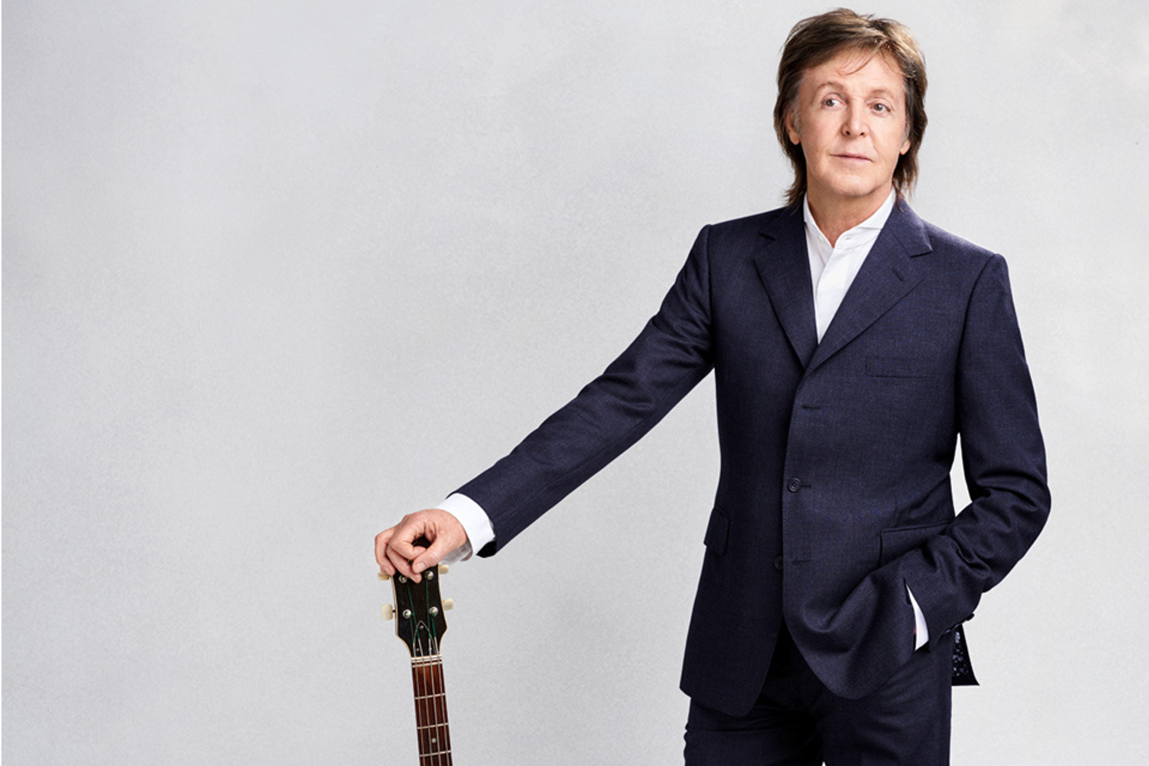 Photo of Paul standing up with his Hofner Bass 