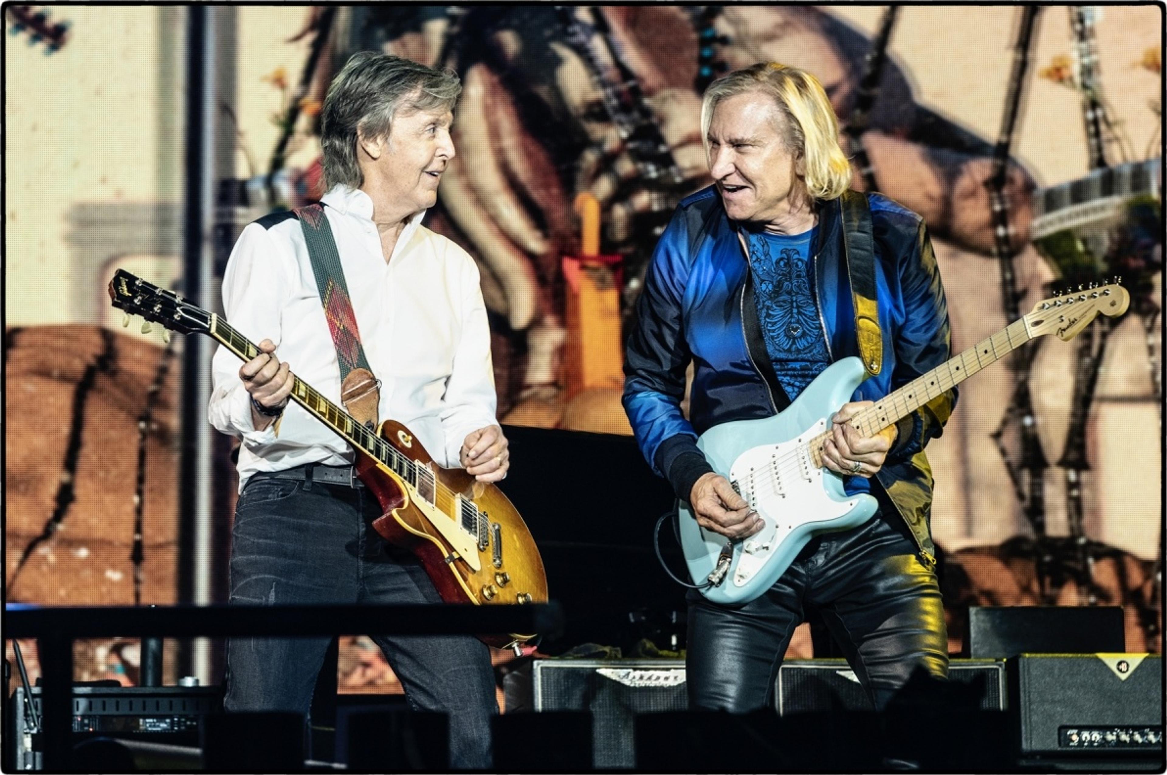 Joe Walsh, from The Eagles, joins Paul on stage during his Dodger Stadium show.