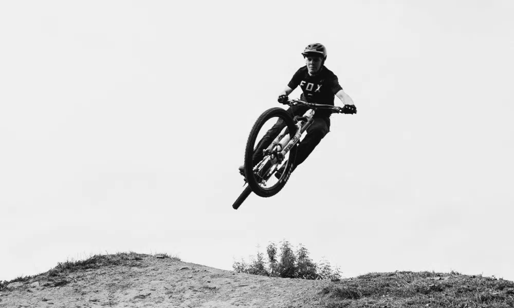 mountain biker getting air on a jump