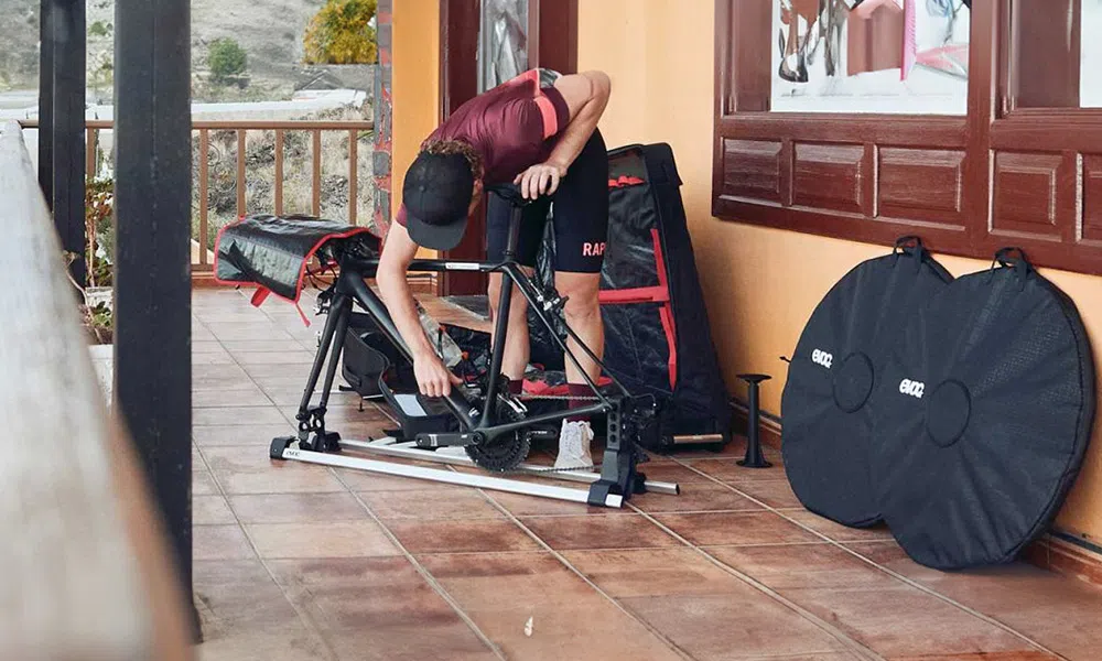 cyclist building bike that was packed in a bike bag