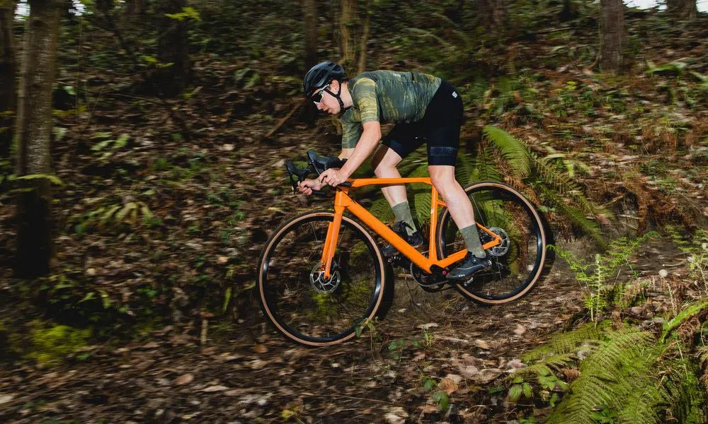 a cyclocross bike is ridden downhill