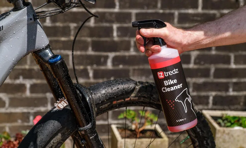 Cleaning a bike with bike cleaner by Tredz