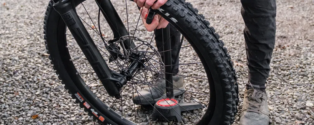 pumping up an mtb tyre