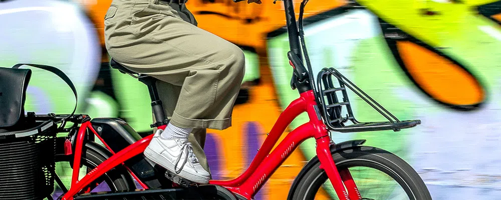 riding an e-bike with a front bike rack