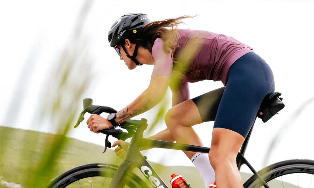 female road cyclist in castelli kit on cervelo bike