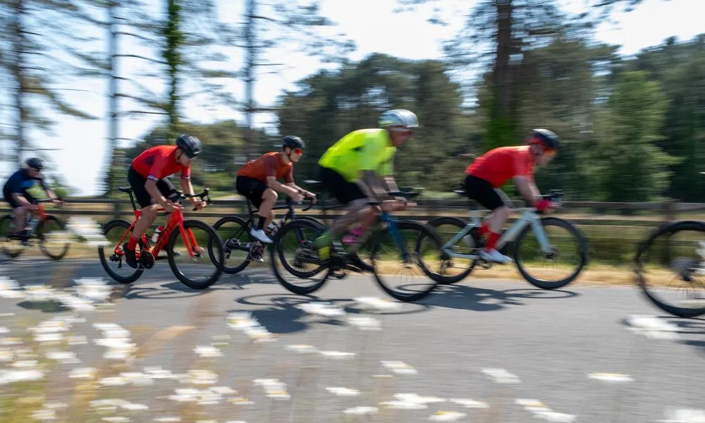 Road riders in a peloton using pirelli tyres