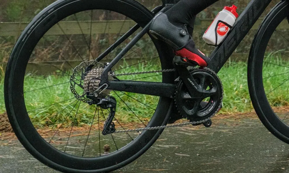 close up of a cassette on a road bike riding past