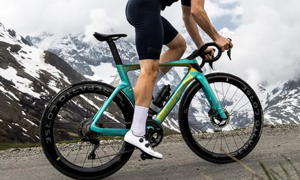 bianchi road bike in the snowy mountains