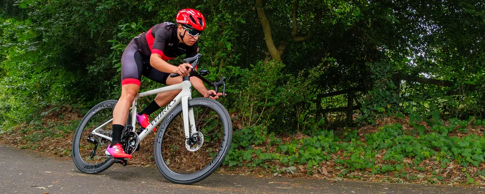 A road bike rides past