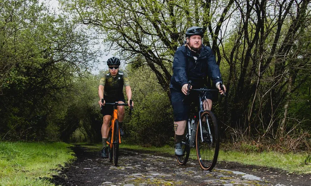 riding gravel bikes on a rough track