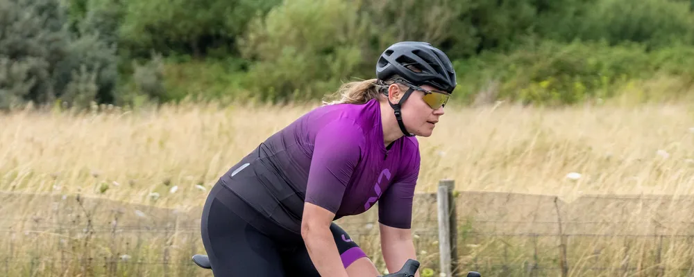 road cyclists close up wearing glasses and helmet
