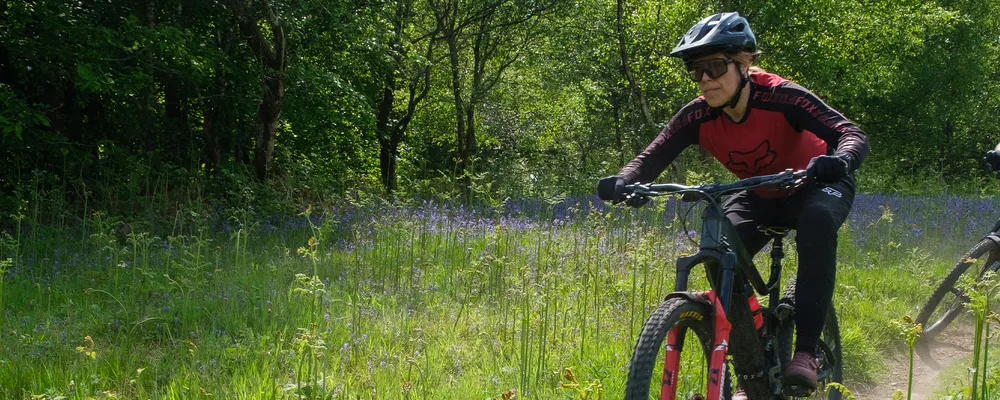 mountain biker riding with glasses 