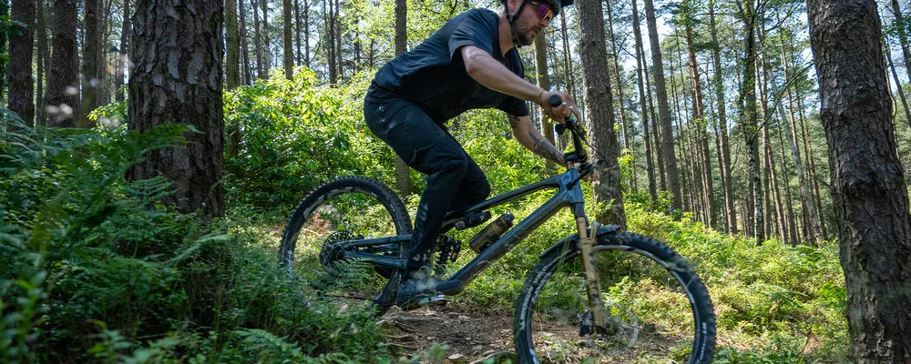 man riding  mountain bike on a spring day
