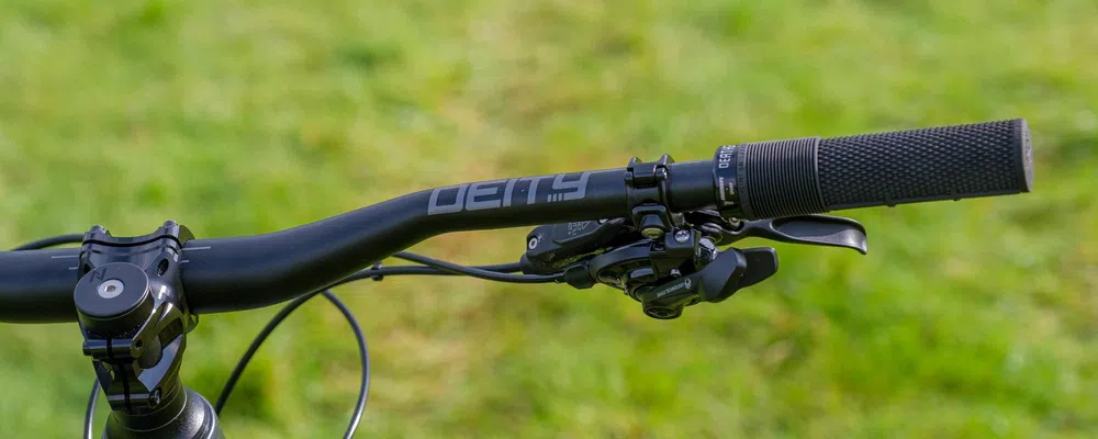 a close up of mountain bike handlebars and grips