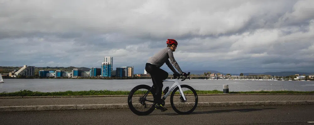 cyclist riding through docks