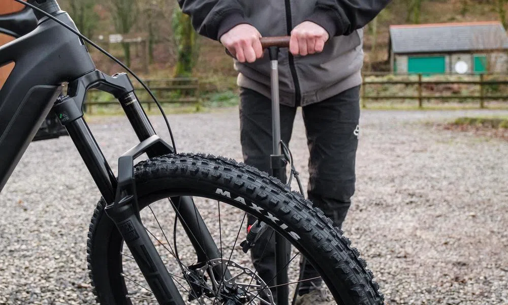 pumping up an mtb tyre