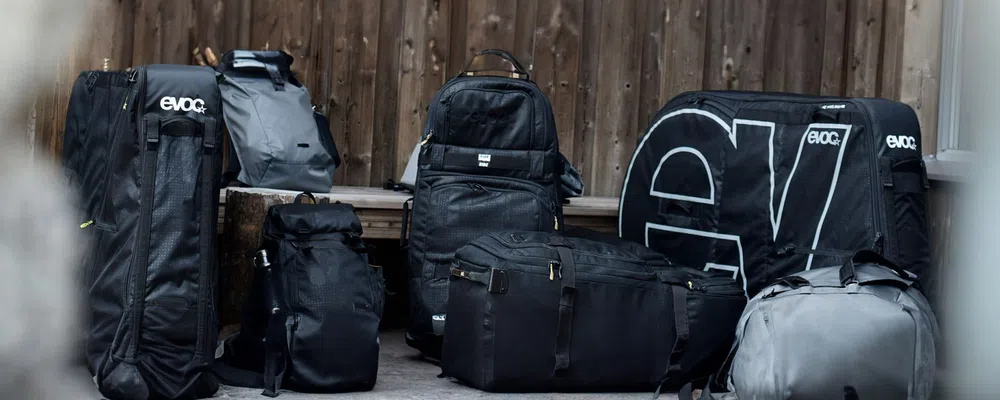 collection of Evoc travel bags