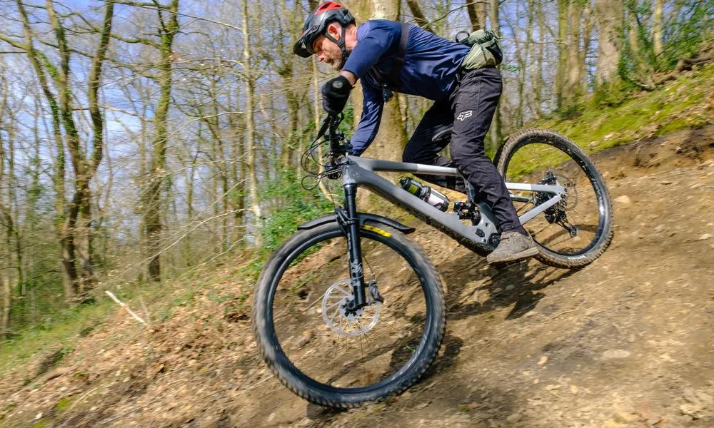 an electric mountain bike rides down hill