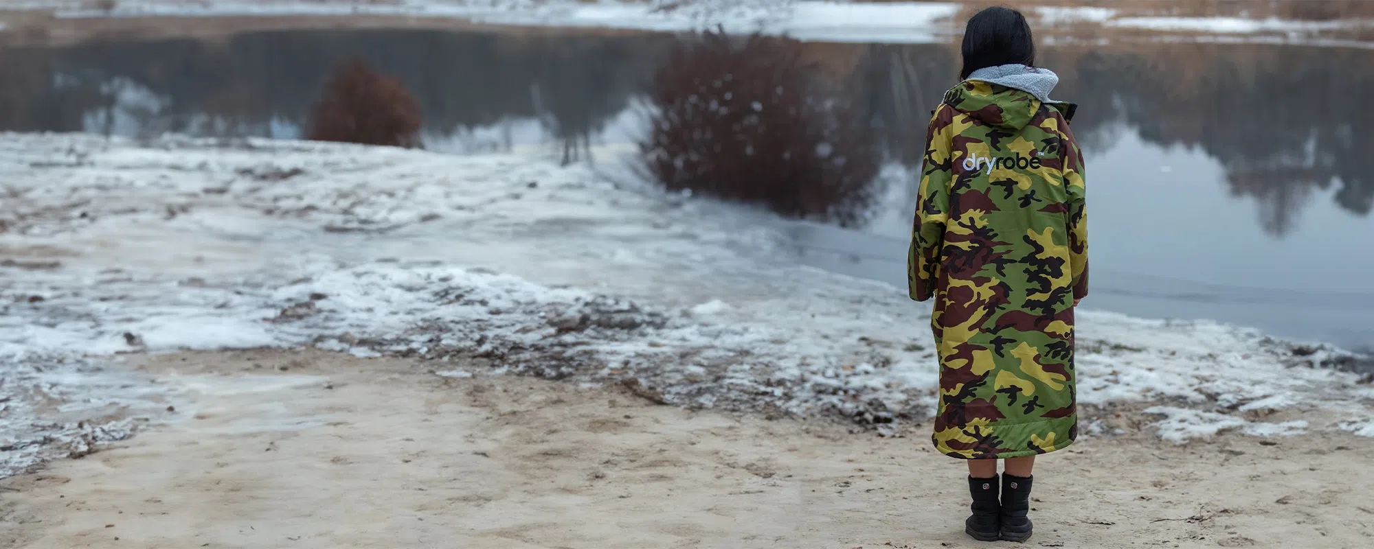 Woman standing in a dryrobe