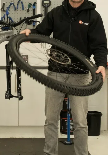 distribute tubeless sealant around mtb wheel to ensure a good seal