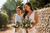 Bride and bridesmaid before wedding with flowers