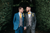 two grooms looking at each other in a bush