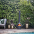 Chimnea outdoor fireplace by pool