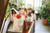 Flower girls holding brides wedding dress train