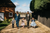 newlywed grooms walking with flower girls and boy