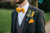 close up picture of a groom in a suit 