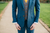 a close up picture of a groom in a wedding suit 