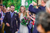 married couple walking whilst guests throw confetti 