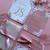 pink and gold wedding stationery set