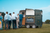 Wedding guests queue outside the green icecream truck at the wedding reception