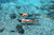 Couple enjoys floats in the sea