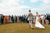 Bride and groom are welcomed by the wedding guests