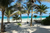 Tropical beach holiday with palm trees