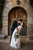 Prezola couple spanish wedding leaning back kissing