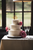 three tier wedding cake with pink flowers 