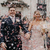 Happy newlyweds leaving Islington town hall with confetti