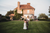 bride and groom first dance in front of church