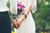 bride and groom holding hands at wedding ceremony 