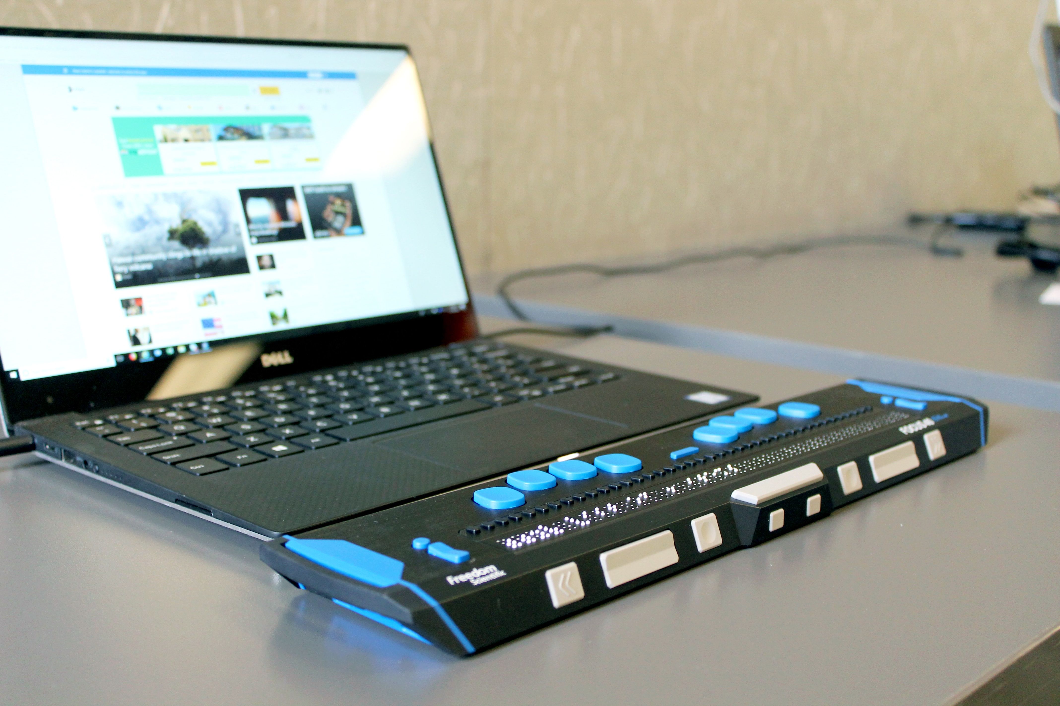 A computer with a refreshable braille display.