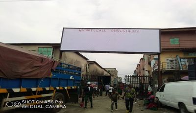 Gantry-Billboard-at-Coker-Road-Orile-Market-Lagos.1.jpg