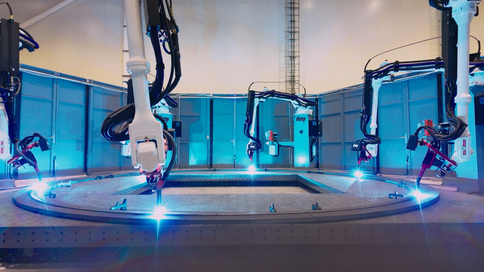 A multi-arm configuration of a WAAM system in-print.