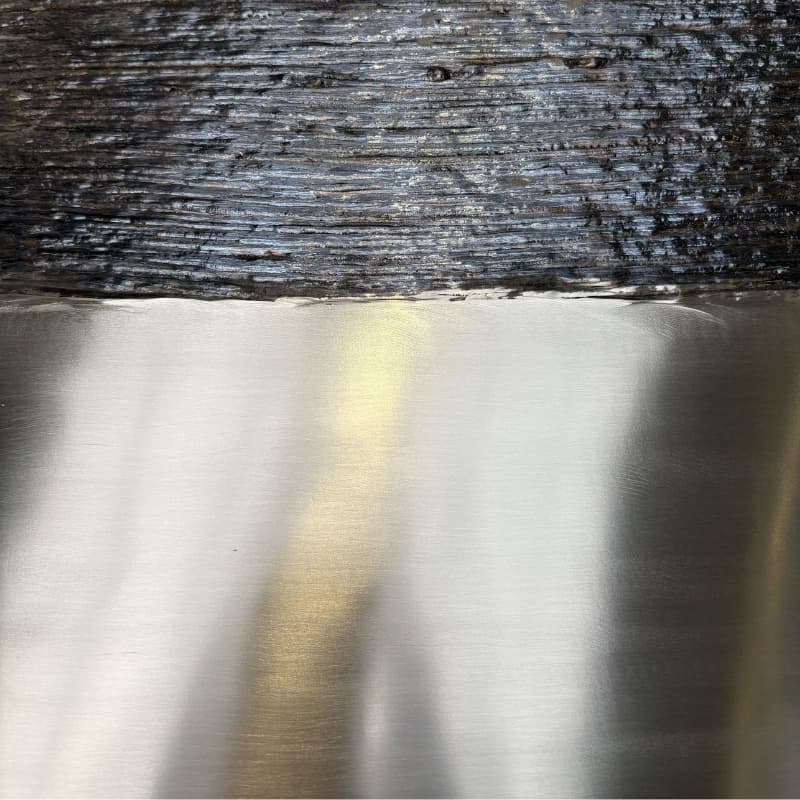 A close up image of a golden coloured, Nickel Aluminium Bronze component.
