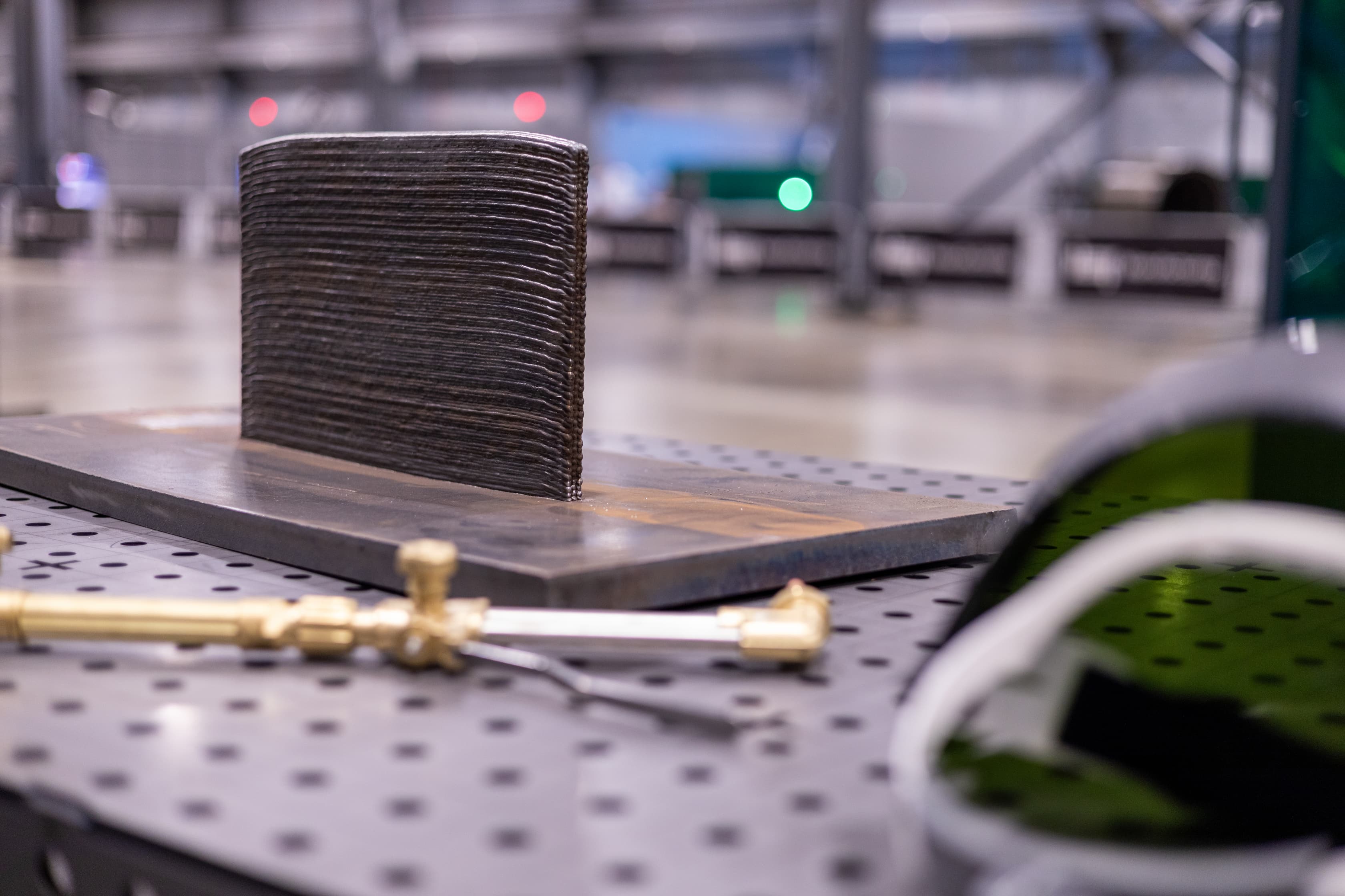 An image off a 3D printed metal block.