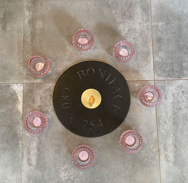 Shrine relic of St Boniface surrounded by candles