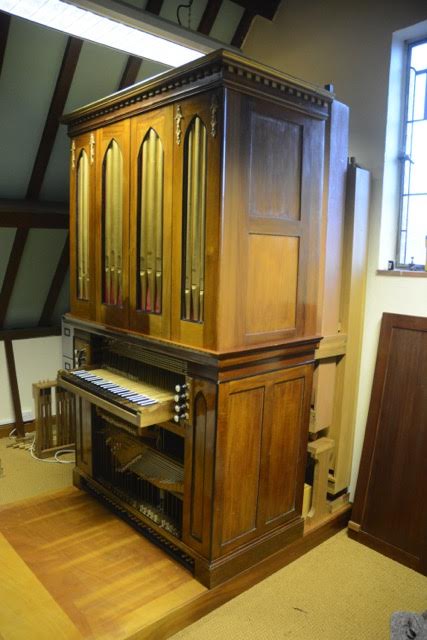The Gray chamber organ in its wooden case, in the organ builder's workshop